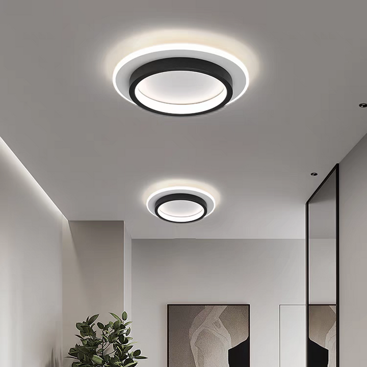 Rousen Round LED Ceiling Lamp installed in a bright modern hallway