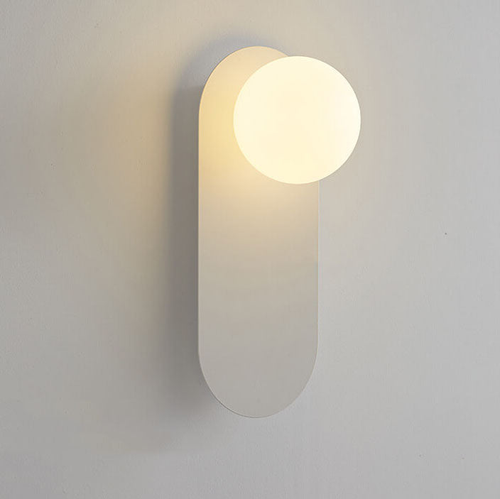 Nordic minimalist glass globe wall sconce in living room