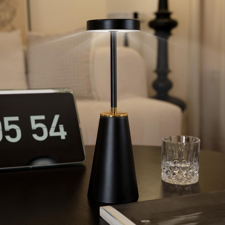 Gleon dimmable warm white LED lamp in black finish on desk