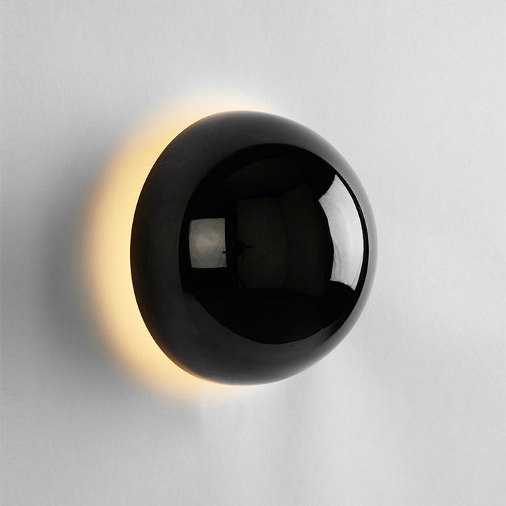 Bauhaus glass globe LED wall light - eclipse effect when lit