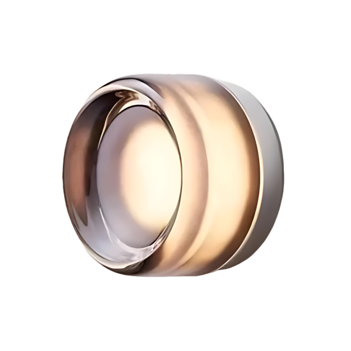Nordic acrylic dimple LED wall sconce in smoky grey diffusing soft light on a bedroom wall