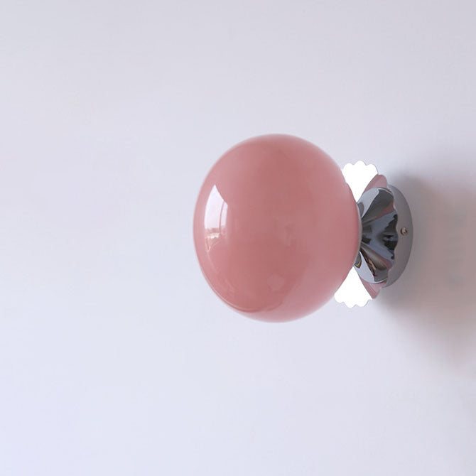 Modern minimalist glass globe wall light - close-up of glass