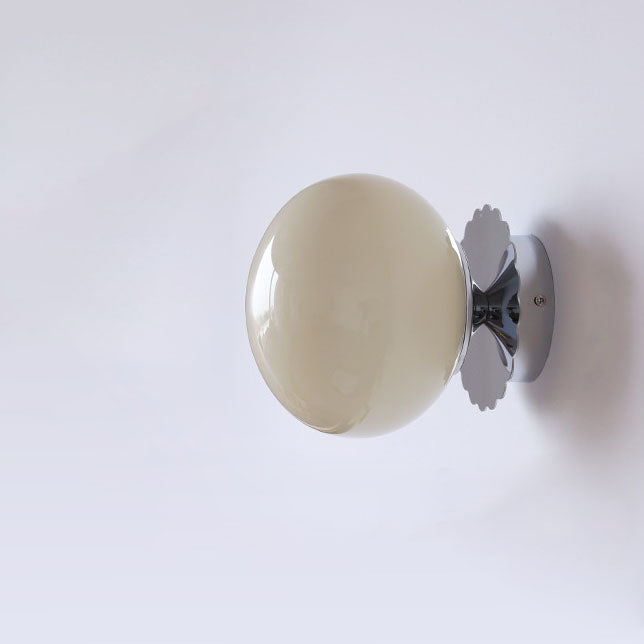 Modern minimalist glass globe wall light - iron base detail