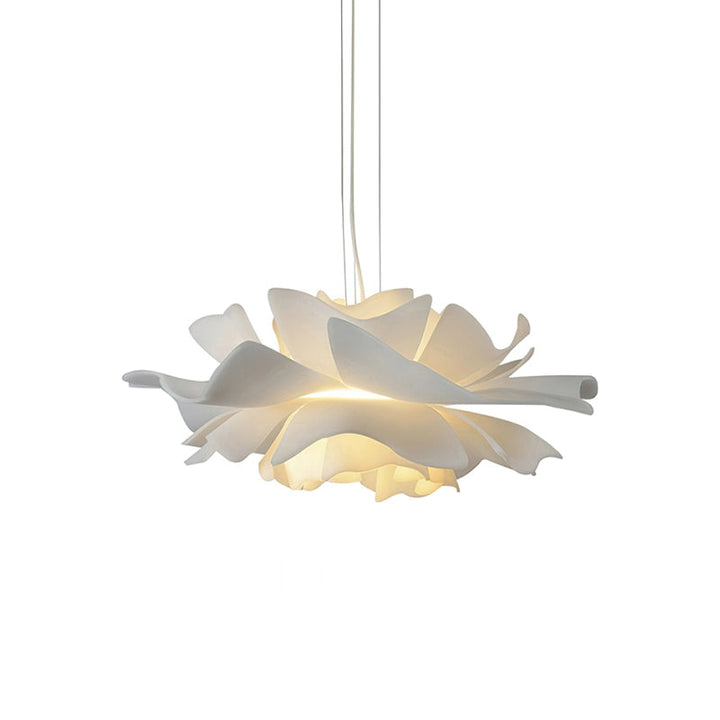 White Lotus pendant light with sculptural ceramic petals over dining table