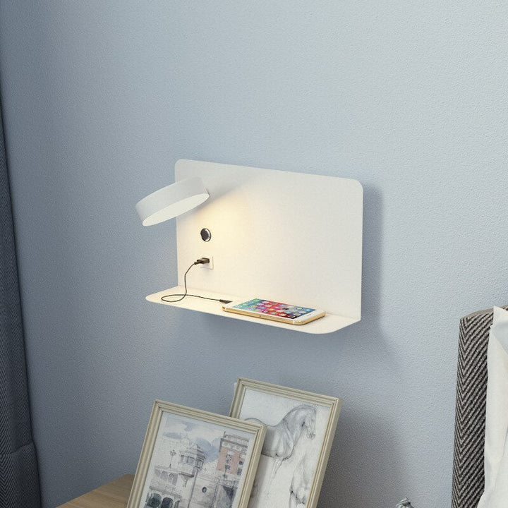 Sylvaris wall lamp left-facing variant in a hotel-style bedroom