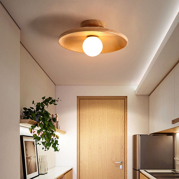 Losnero ceiling lamp from below – circular wood form