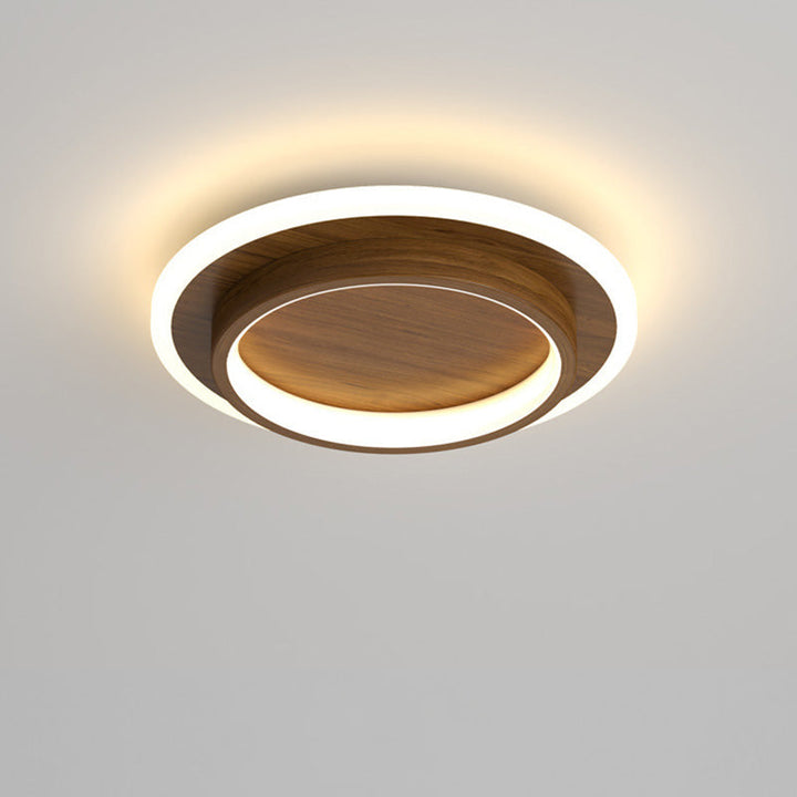 Rousen LED ceiling lamp glowing soft white in living room