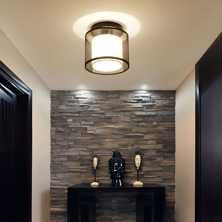 Civvano ceiling lamp close-up showing minimalist fabric and metal design