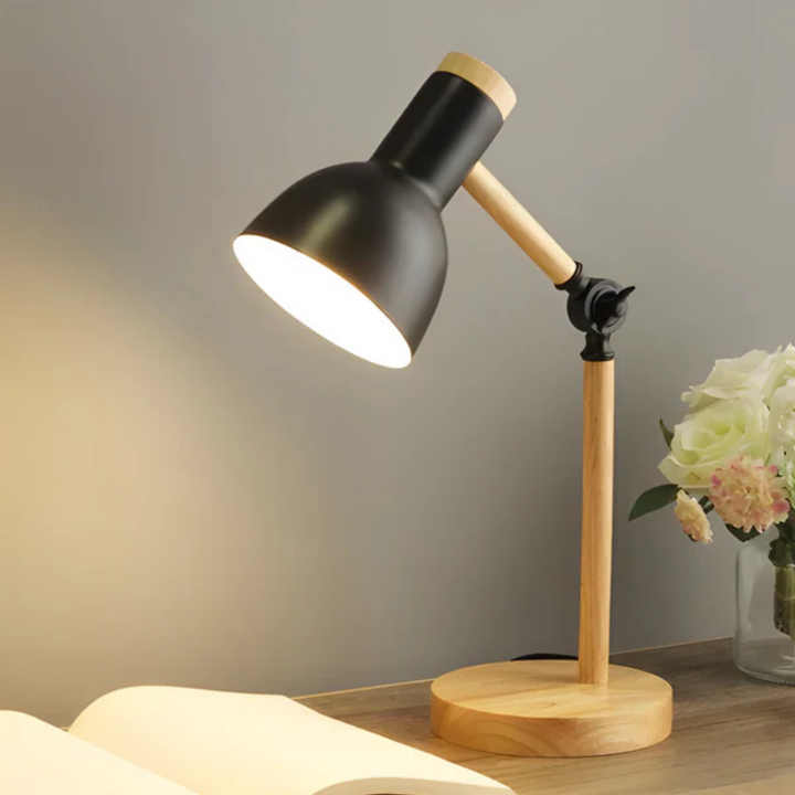 Nord macaron LED lamp in pink styled on a bedside table