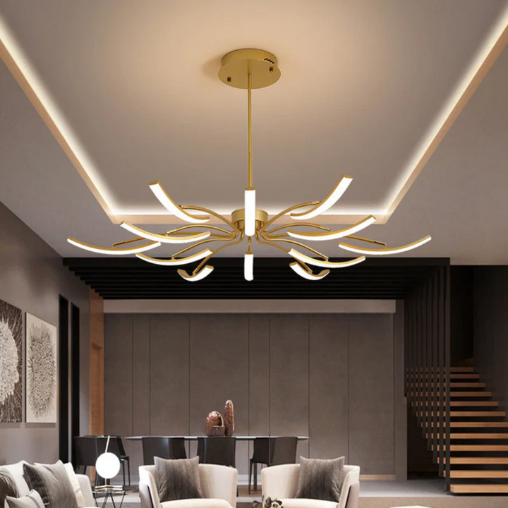 Ignis gold LED pendant light hanging in a modern living room
