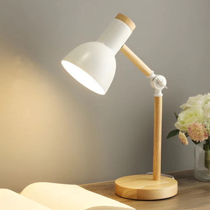 Nord wooden macaron LED table lamp in mint green on a study desk