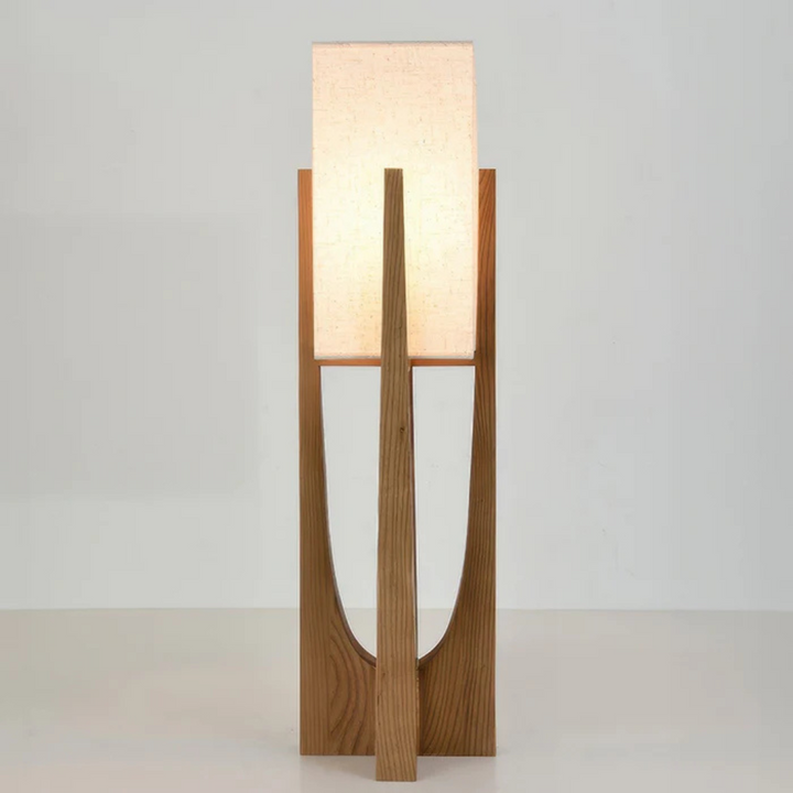 Luxora walnut standing lamp lifestyle shot in a living room