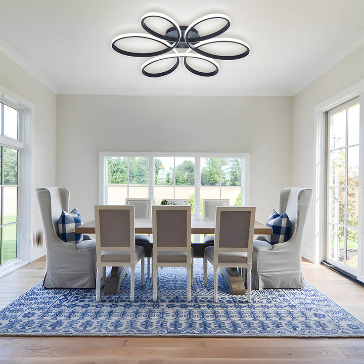 Slim flush mount LED ceiling light shown over a contemporary lounge