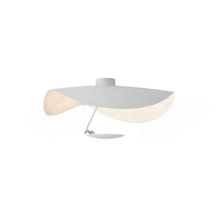 White and gold modern LED ceiling lamp lighting a dining room