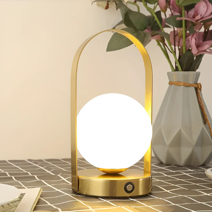 Cindor wireless table lamp in red, glowing warmly