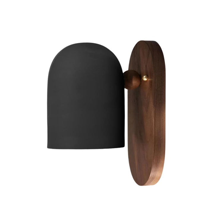 Walnut metal LED wall sconce in white finish on light wall
