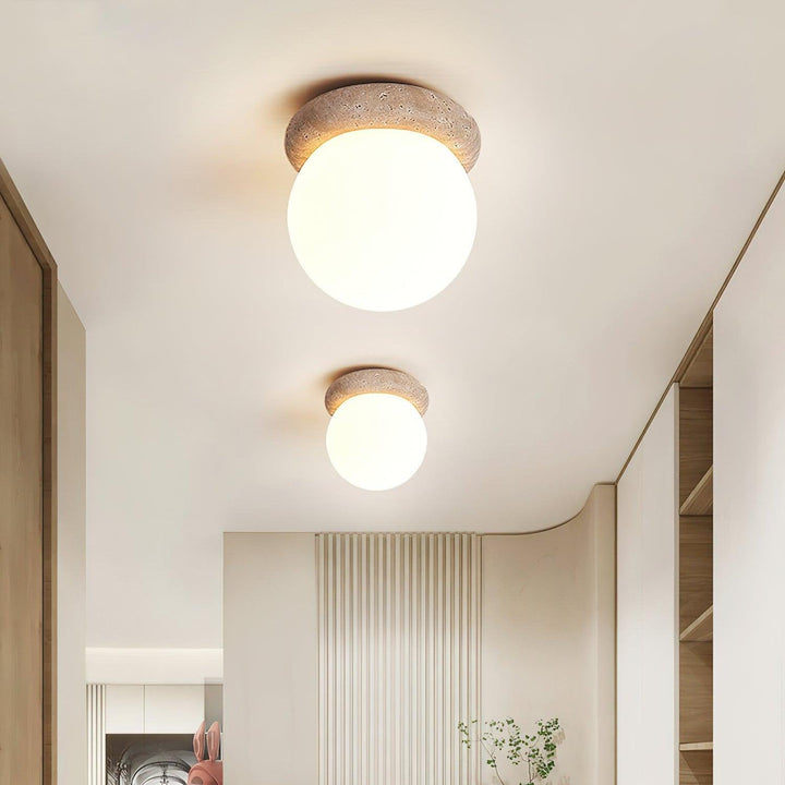Serica travertine LED ceiling lamp natural stone close-up