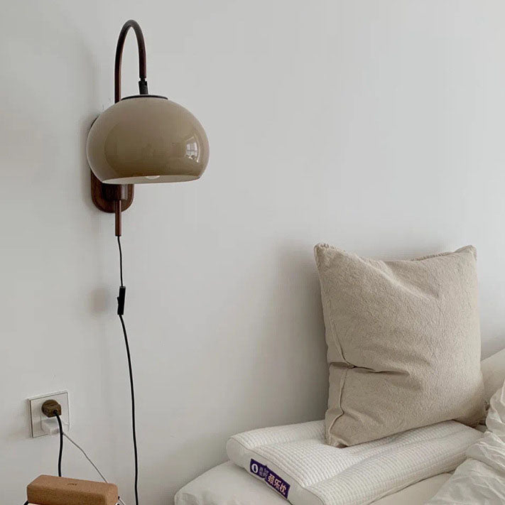 Hardwired wood wall sconce variant in modern lounge