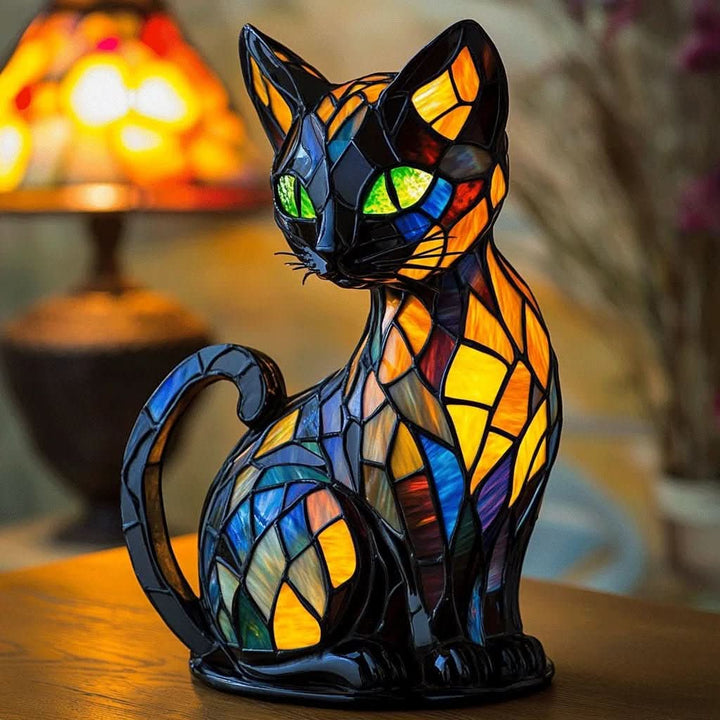 Felina LED cat night light glowing softly on a bedside table