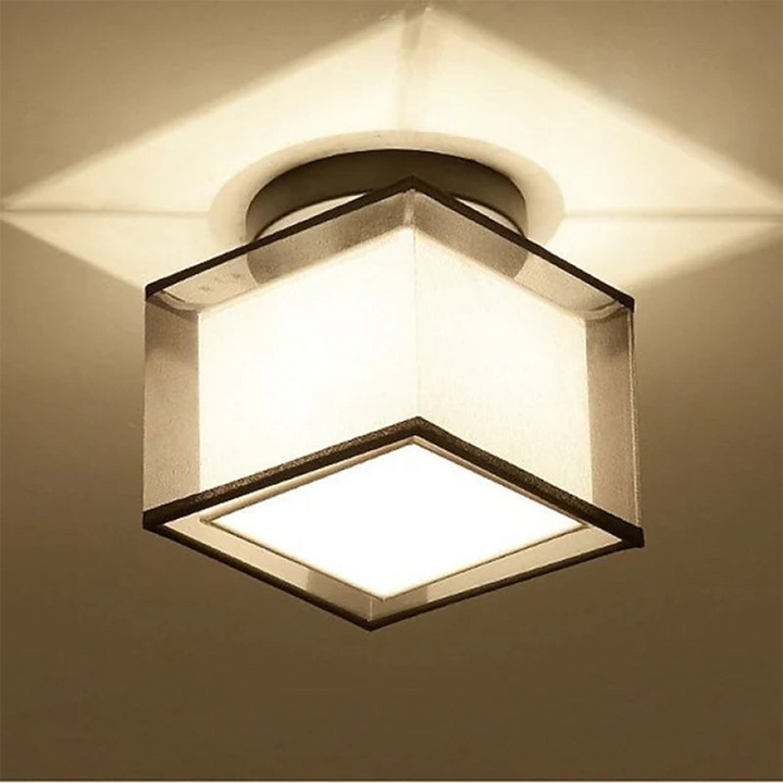 Civvano modern ceiling lamp with fabric shade in cosy UK living room