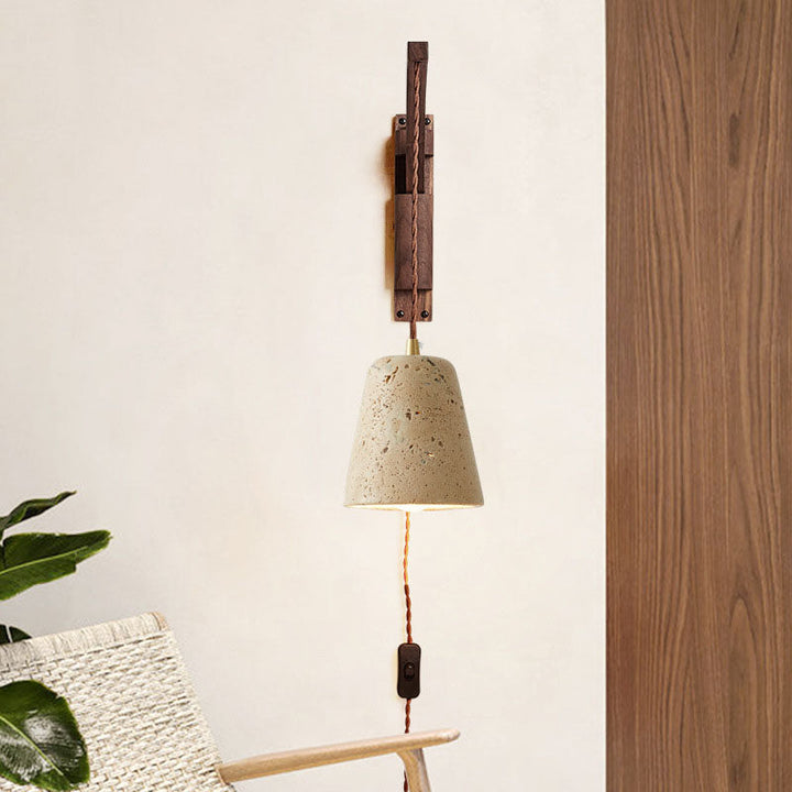Close-up of natural wood grain and frosted glass dome on Japanese wall lamp