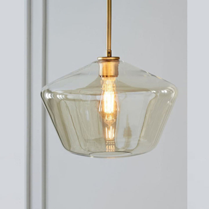 Close-up of the Juno Pendant Light pendant light glass base and shade