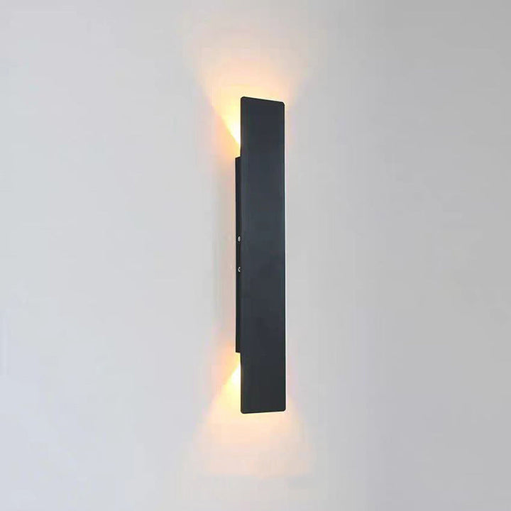 Slim rectangular wall sconce with up and down light beams