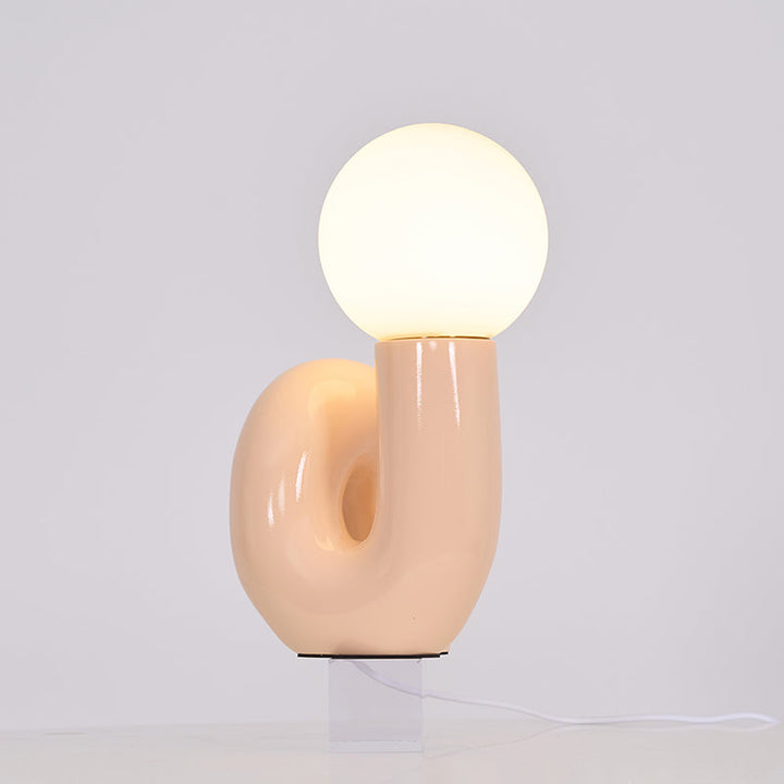 Neo Table Lamp – sculptural resin pebble base with glass globe – view 1