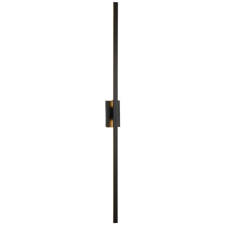 Linear LED wall sconce shown beside bathroom mirror