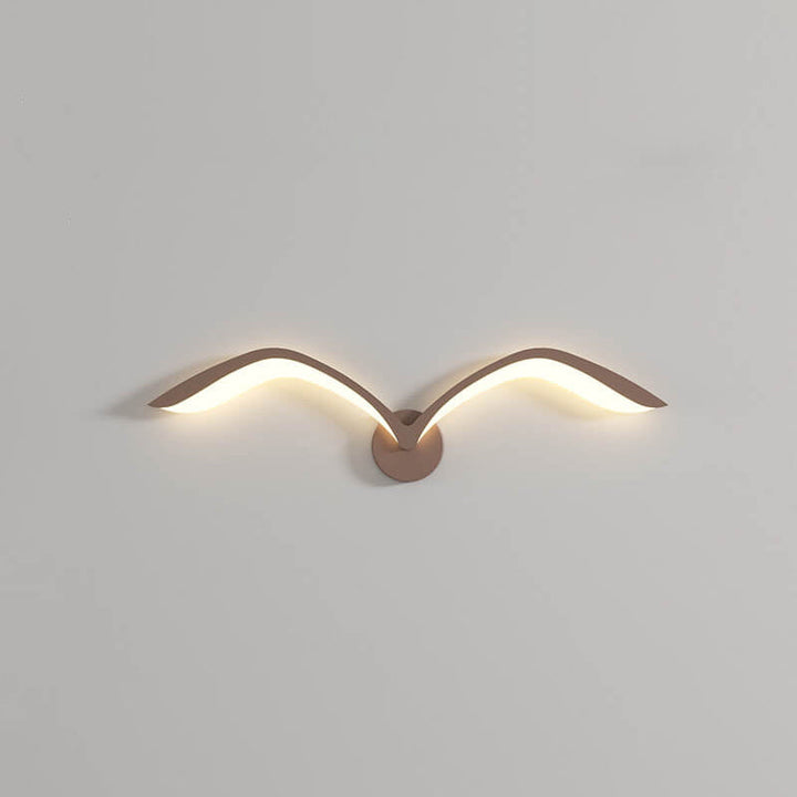 Brown Nordic seagull wall sconce as a sculptural living room accent