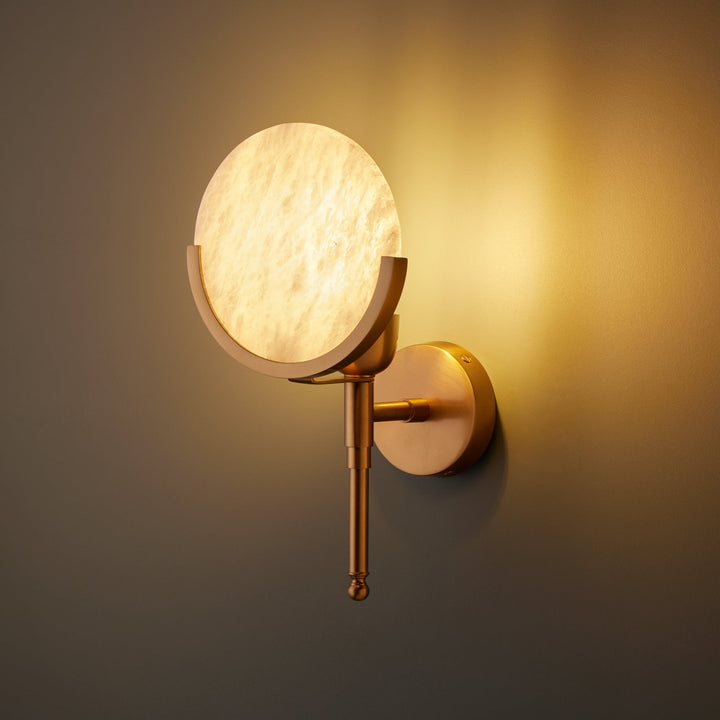 Side profile of Firefly antique brass wall light with alabaster shade