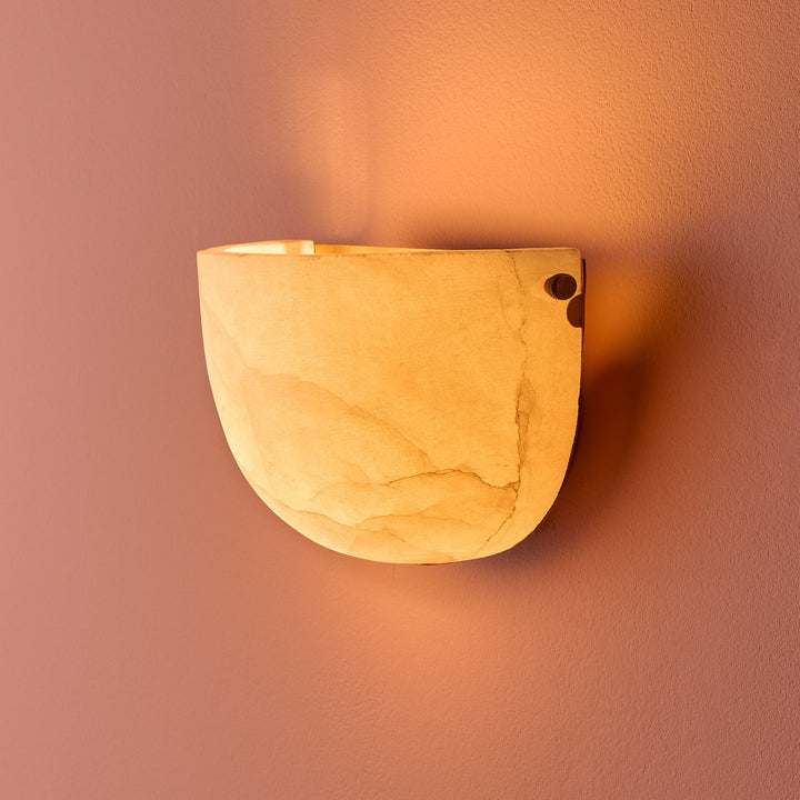 Side profile of Socrates wall light showing brass backplate