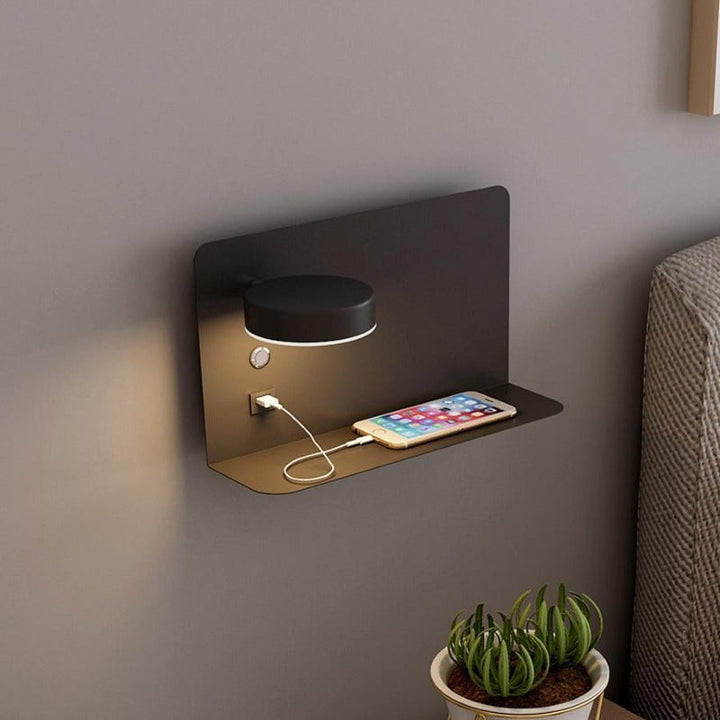 Sylvaris wall mounted bed lamp in white with warm reading glow